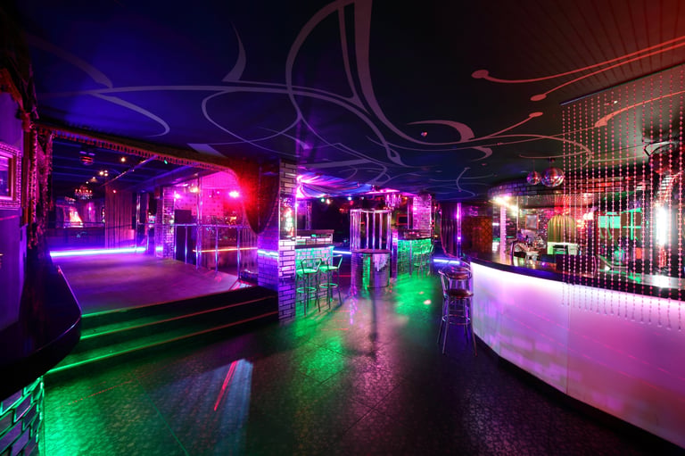 Colourful interior of a London nightclub with atmospheric lighting