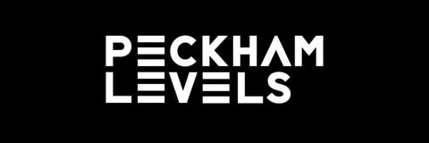 Peckham Levels logo in white text on black background