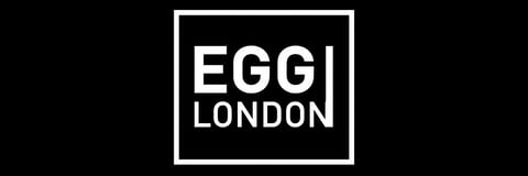 Egg London logo with white text inside a rectangular frame on black background